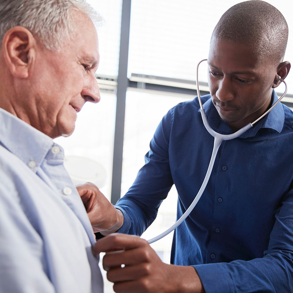 Doctor checking patient with stethoscope